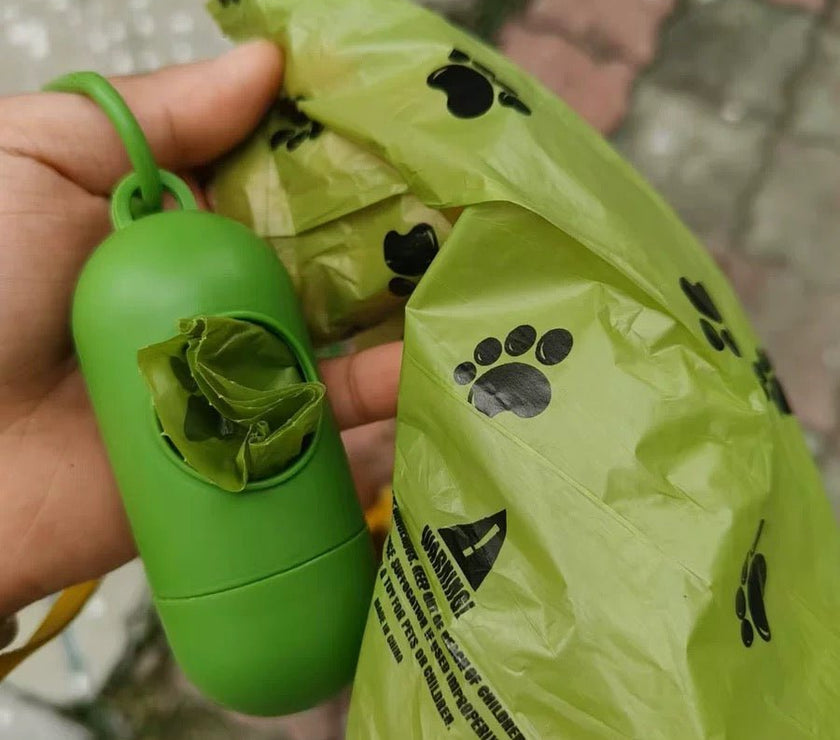 biodegradable trash pet poop bags along with a dispenser designed for convenience and environmental sustainability