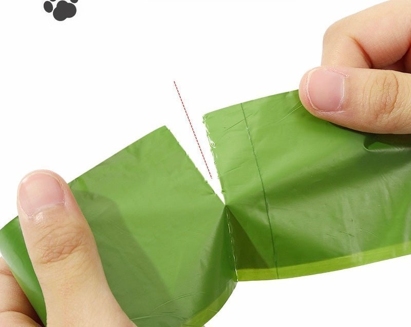biodegradable trash pet poop bags along with a dispenser designed for convenience and easy to tear