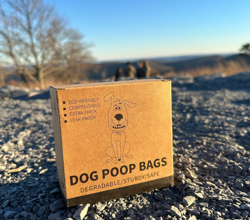 biodegradable trash pet poop bags along with a dispenser designed for convenience and easy to tear