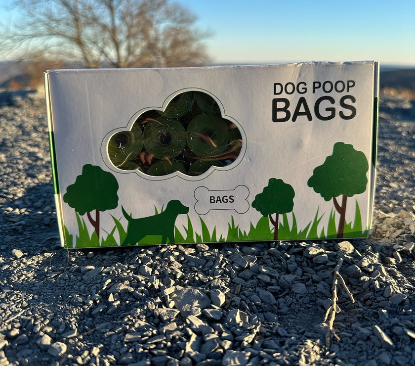 biodegradable trash pet poop bags along with a dispenser designed for convenience and environmental sustainability